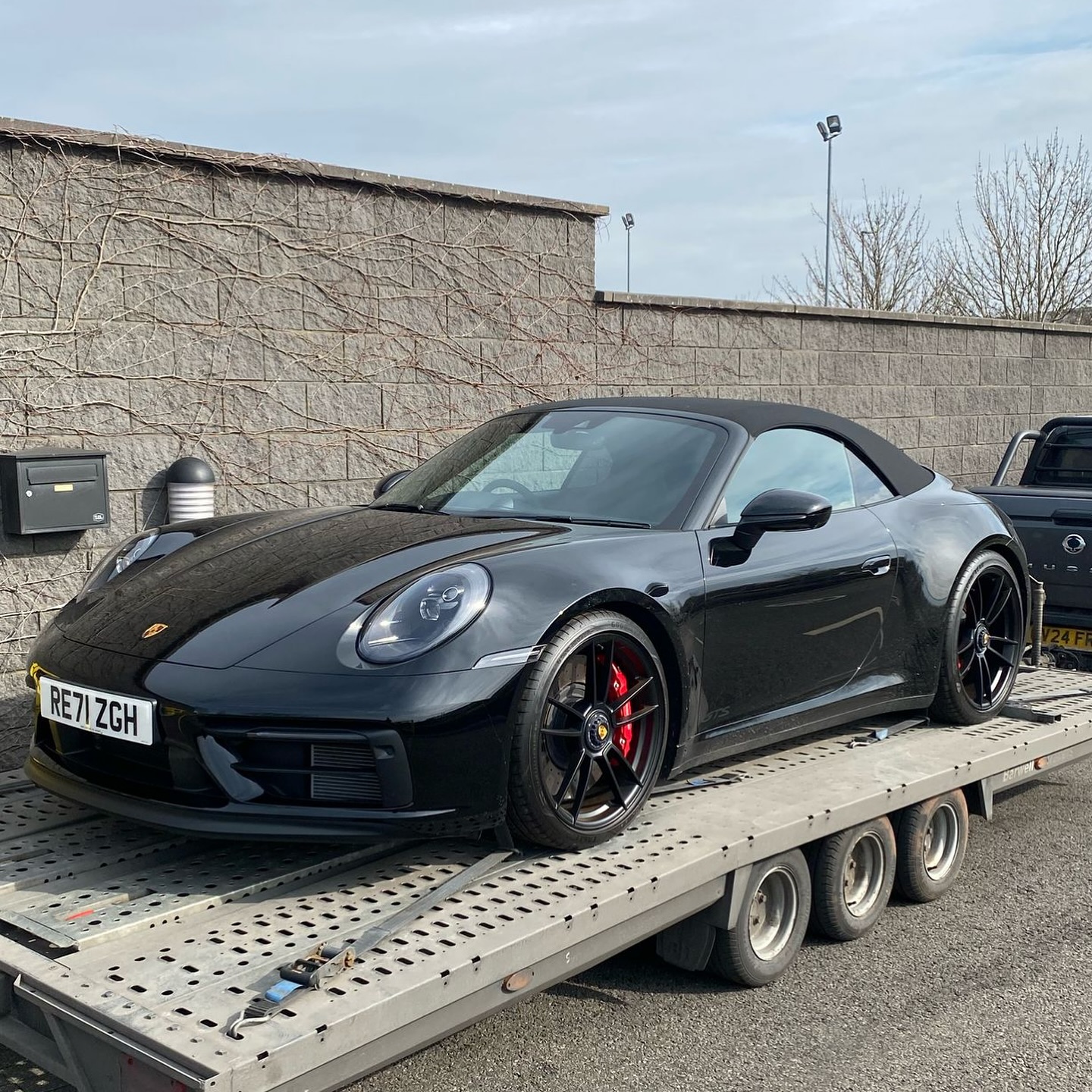 Porsche 911 GTS Cabriolet transported by XLR8 Movements